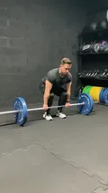 Conventional barbell deadlift for total back and leg strength
