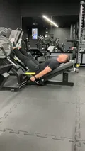 Leg press machine for quad strength