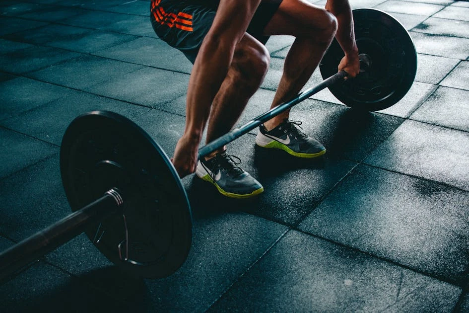 Person holding barbell