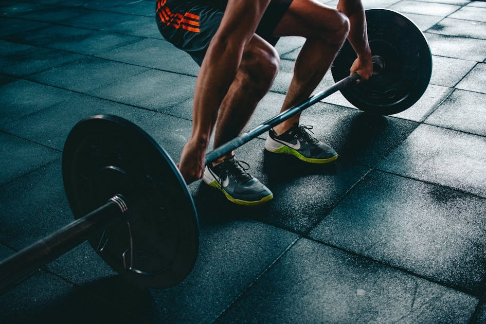 Person holding barbell