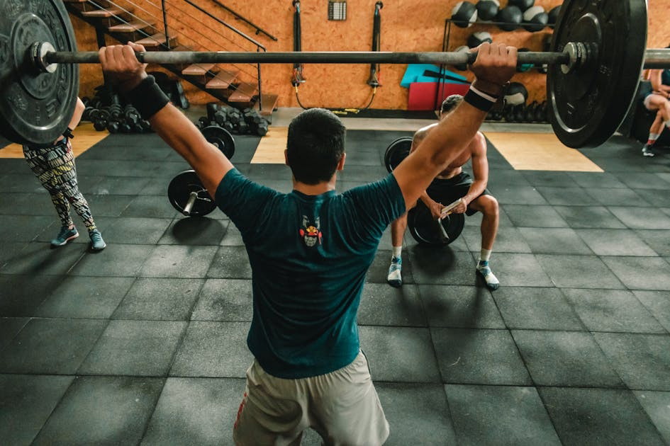 Person lifting barbell